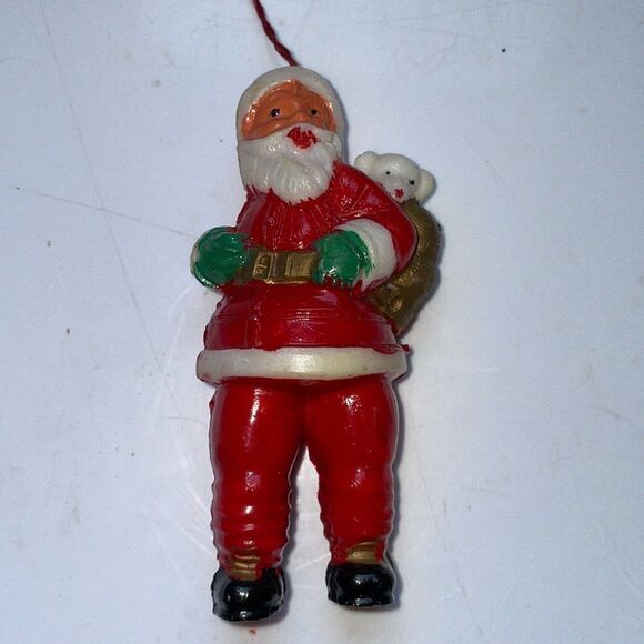 Vintage hollow plastic Santa Claus with sack Christmas tree ornament - Picture 1 of 6